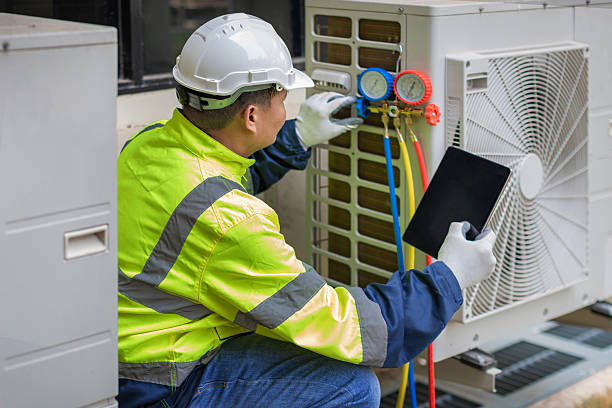 Professional Air Conditioning Repair technician working in Mesa, WA